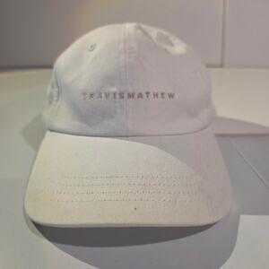 Travismathew white embroidered script logo